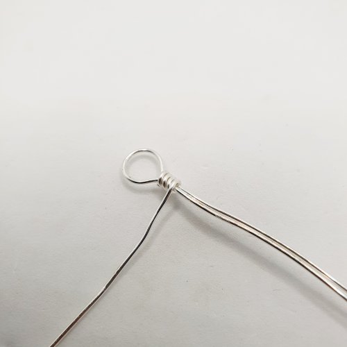 Natalie Patten's Gemstone and Spacer Bead Bangle - , Contemporary Wire Jewelry, Wire Wrapping, Wrapping, Wire Wrapping Jewelry, Beads, , Wrap this shorter wire around a few times to secure underneath the loop