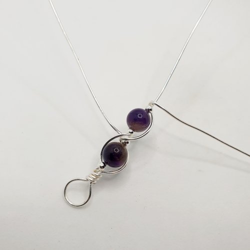 Natalie Patten's Gemstone and Spacer Bead Bangle - , Contemporary Wire Jewelry, Wire Wrapping, Wrapping, Wire Wrapping Jewelry, Beads, , bring the first wire over the central wire again