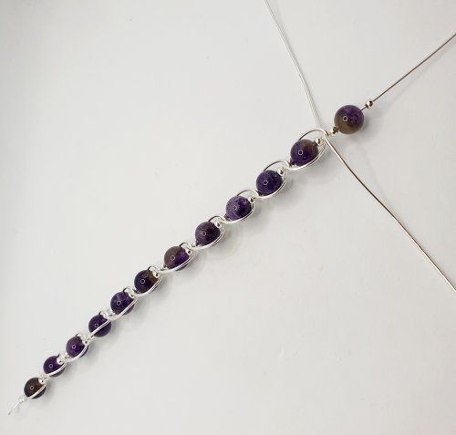 Natalie Patten's Gemstone and Spacer Bead Bangle - , Contemporary Wire Jewelry, Wire Wrapping, Wrapping, Wire Wrapping Jewelry, Beads, , Add on your final section of 3 beads, to determine the approximate length of your bracelet.