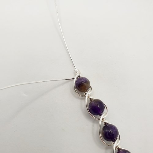 Natalie Patten's Gemstone and Spacer Bead Bangle - , Contemporary Wire Jewelry, Wire Wrapping, Wrapping, Wire Wrapping Jewelry, Beads, , tuck the wires into the middle