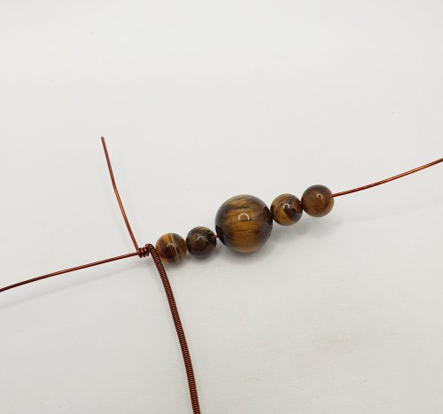 Natalie Patten's Pawprint Pendant and Earrings - , Contemporary Wire Jewelry, Coiling, Coiling Wire, Wire Coiling, Wire Wrapping, Wrapping, Wire Wrapping Jewelry, string on the beads