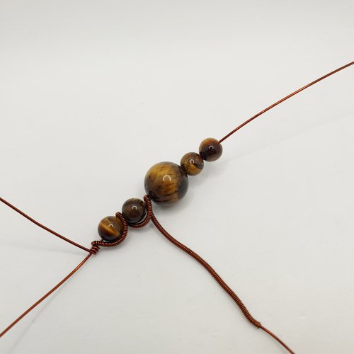 Natalie Patten's Pawprint Pendant and Earrings - , Contemporary Wire Jewelry, Coiling, Coiling Wire, Wire Coiling, Wire Wrapping, Wrapping, Wire Wrapping Jewelry, wrap the coil around the next bead