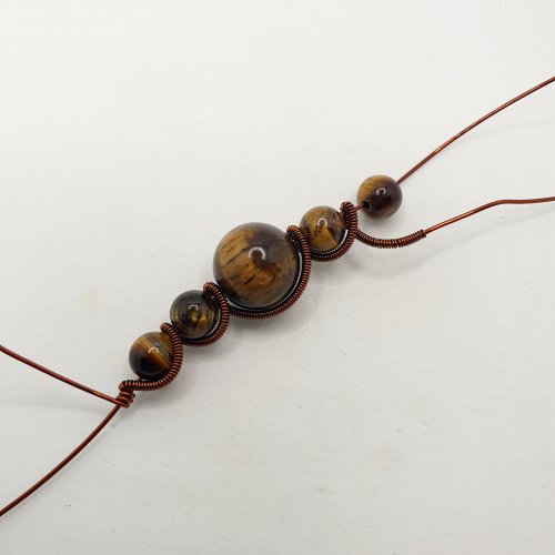 Natalie Patten's Pawprint Pendant and Earrings - , Contemporary Wire Jewelry, Coiling, Coiling Wire, Wire Coiling, Wire Wrapping, Wrapping, Wire Wrapping Jewelry, secure the coil around the base wire