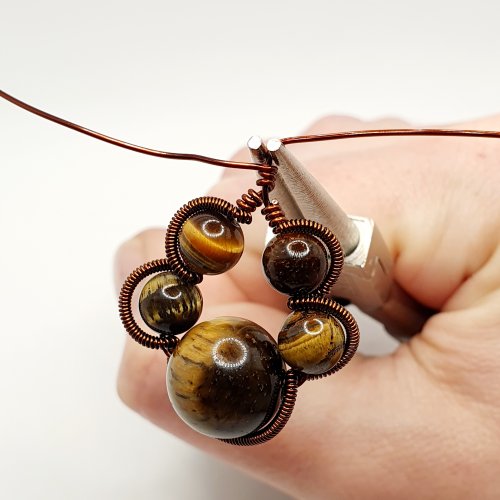Natalie Patten's Pawprint Pendant and Earrings - , Contemporary Wire Jewelry, Coiling, Coiling Wire, Wire Coiling, Wire Wrapping, Wrapping, Wire Wrapping Jewelry, twist the wires together