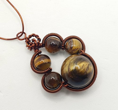 Natalie Patten's Pawprint Pendant and Earrings - , Contemporary Wire Jewelry, Coiling, Coiling Wire, Wire Coiling, Wire Wrapping, Wrapping, Wire Wrapping Jewelry, paw print wire and bead pendant