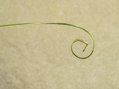 Nancy Chase's Canna Leaf Wire Tornado Bead Necklace - , Contemporary Wire Jewelry, Wire Wrapping, Wrapping, Wire Wrapping Jewelry, start a small spiral with the wire