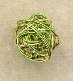Nancy Chase's Canna Leaf Wire Tornado Bead Necklace - , Contemporary Wire Jewelry, Wire Wrapping, Wrapping, Wire Wrapping Jewelry, trim and tuck the end of the wire