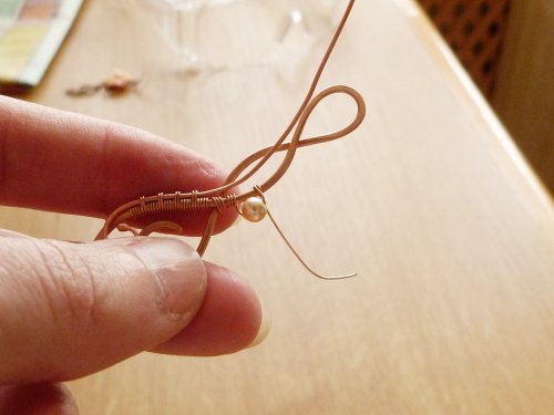 Oksana Truhan's Bloom Wire Earrings - , Wire Weaving, Coiling, Coiling Wire, Wire Coiling, Loops, Wire Loop, Wrapped Wire Loop, Spirals, Wire Spiral, Spiral Wire Wrap, Oxidizing Wire, Oxidizing, Antiquing Wire, Antiquing, Wire Wrapping, Wrapping, Wire Wrapping Jewelry, Weaving, Wire Weaving, Weaving Wire, Butane Torch, Soldering, Solder, string on the bead and coil next to it 4 times