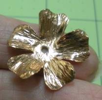 Judy Larson's Petal Forming on a Wood Block - , Metalwork, Dapping, Dapping Jewelry, Sawing, Saw, Wire Saw, Texturing, Design, Finished textured petal metal flower