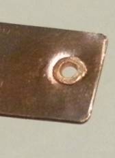 Judy Larson's Using Tiles on Tube Rivets and Eyelets - , Metalwork, How To Punch Holes, Hole Punching, Punch A Hole, Riveting, Riveting Techniques, Wire Rivets, Design, Tools, Finished back side of copper rivet tube