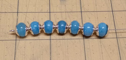 Judy Larson's Bead Cap Primer - What bead caps can do for my rondelle beads:, Wire Jewelry Design, Dapping, Dapping Jewelry, Filing, Finishing, How To Punch Holes, Hole Punching, Punch A Hole, bead cap primer